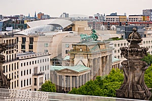 View from Reichstag to Brandenburg Gate and cityscape of Berlin, Germany photo