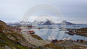 View of Reinesjoen and Harbour of Ballstad in the Lofoten in Norway in winter