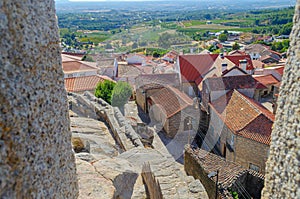 view of the remains of the walls and the medieval town of Castelo Novo, Portugal photo