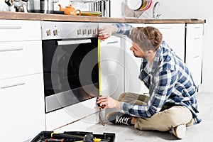 view of repairman on blurred background