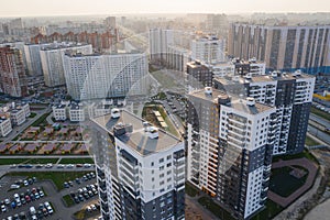 View of the residential area of St. Petersburg at sunrise, modern buildings, Parking, cars, new building