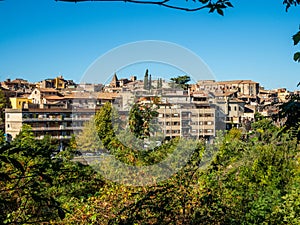 View of residential areas on the banks of the river Aniene in Tivoli photo