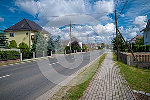 View of residential houses in Upper Silesia, Opole Voivodeship, Poland on a sunny day photo
