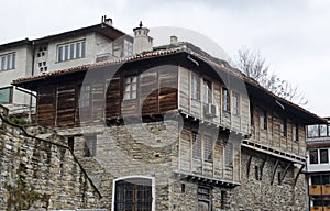 View of a residential neighborhood with old houses interestingly situated next to each other on a steep hill in Veliko Tarnovo