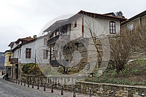 View of a residential neighborhood with old houses interestingly situated next to each other on a steep hill in Veliko Tarnovo