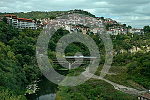 View of a residential neighborhood with old houses interestingly situated next to each other on a steep hill in Veliko Tarnovo