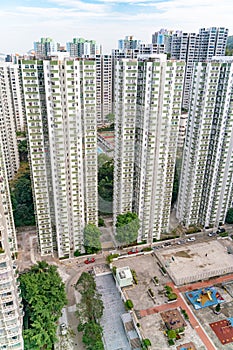 The view of residential neighborhood and skyscrapers from rooftop in Hong Kong