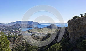 View of the resort town of Sudak and the medieval Genoese fortress from a mountain slope