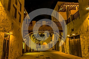 A view of a restored street in the Al Fahidi district at night in Dubai, UAE