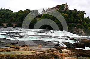 View of the Rheinfall waterfall and the Laufen castle near the town of Neuhausen in Switzerland