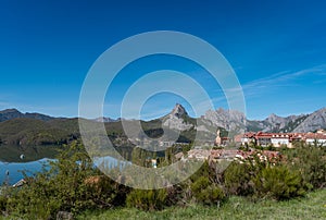 view of Riaño in a sunny day with the mountains in the background. León. Spain