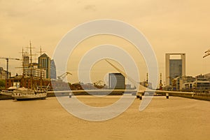 View of the Rio de la Plata, with the bridge of the woman, in the port district of Puerto Madero, the old port of Buenos Aires