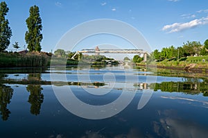 view of the river Bega and a cloudy sky, city of Timisoara, Romania