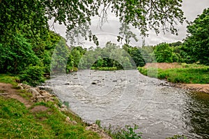 A view of River Don flowing in Seaton park in summer time, Aberdeen