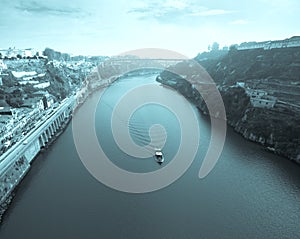 View of the River Douro and waterfronts in the city of Porto. Sunny day. Toned photo