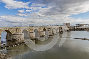 View of the river Guadalquivir river and the Roman bridge of Cordoba