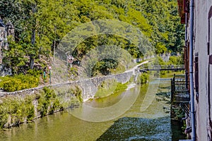 View of the river Nive as it passes through the village Saint Jean Pied de Port. Aquitaine France