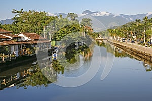 View of river Pereque-Acu and mountains in background, Unesco World Heritage town Paraty, Brazil