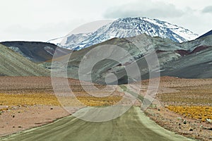 View of road and mountains in Sico Pass photo