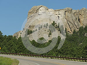 View from the road of the stone monuments of four US presidents at Mount Rushmore National Memorial in South Dakota