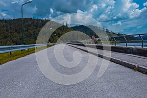 View of road on water dam or Vodna Nadrz in Nova Bistryca, Slovakia. Big water dam and reservoir for the safety of the people and