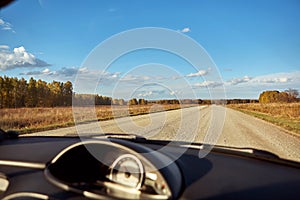 View of the road through the windshield of the car