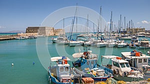 View on a Rocca a Mare fortress and port with boats in Heraklion, Crete island, Greece, 18 july 2019