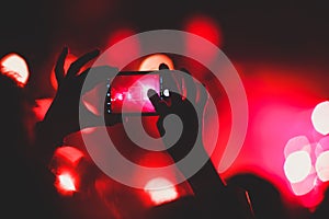 View of rock concert show in big concert hall, with crowd and stage lights, a crowded concert hall with scene lights, rock show pe