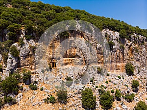 Rock-cut tomb carved in vertical rock, Cyaneae, Turkey