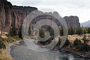 View of rock formations and the Nork Fork Shoshone River near Cody, Wyoming in fall