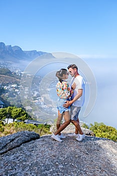 view from The Rock viewpoint in Cape Town over Campsbay, view over Camps Bay with fog over the ocean