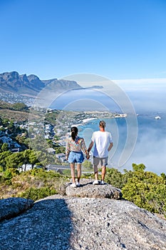 view from The Rock viewpoint in Cape Town over Campsbay, view over Camps Bay with fog over the ocean