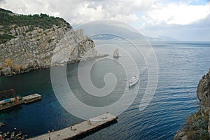 View of the rocks of the city of Yalta. Rock sail. Seascape. Outlier rock near the city of Yalta, Crimea. Rock in the