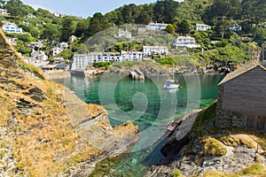 View from rocks at entrance to Polperro Cornwall England photo
