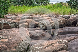 View of rocks of the Lucala river, in the water bodies of Kalandula, with signatures carved in the rocks of tourists who pass