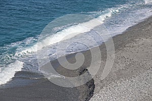 view of the rocky beach of the town of Diamante in the province of Cosenza, Calabria in southern Italy