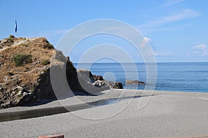view of the rocky beach of the town of Diamante in the province of Cosenza, Calabria in southern Italy