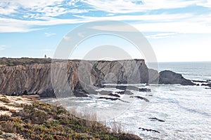 View of the rocky coastline near the town of Cavaleiro in the Odemira region, western Portugal. Wandering along the Fisherman photo