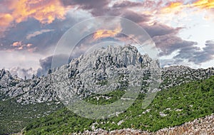 View of the rocky mountain and the contrasting cloudy sky