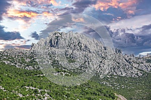 View of the rocky mountain and the contrasting cloudy sky