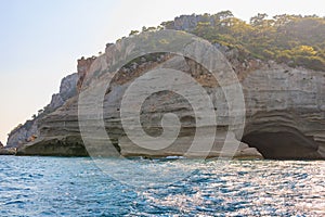 View of the rocky shore from the sea. Mediterranean Sea in Turkey. Popular tourist places. Background