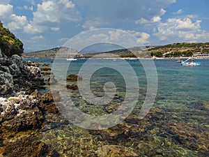 View of the rocky shore of Three island beach photo