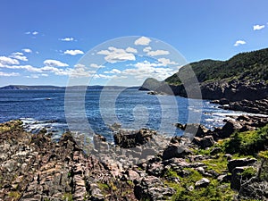 A view of the rocky shoreline along the east coast trail the vast Atlantic while hiking outside of St. Johnâ€™s, Newfoundland a