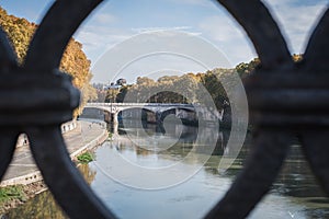 View of a Roman bridge over the Fiume Tevere in Rome