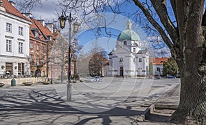 view of the Roman Catholic Church Of St Casimir on rynek Nowego Miasta square, Warsaw, Poland. photo