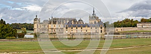 Panoramic of Chantilly castle in France photo