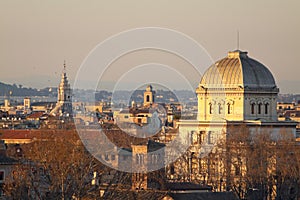 View of Rome roofs: jewish synagogue, Spire of Saint Ivo alla Sapienza, Towerbell of Saint Augustine Church photo