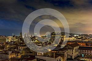 View of the roofs of Barcelona at night - 1