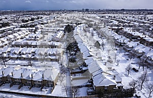 View of Roofs of Houses Covered with Snow