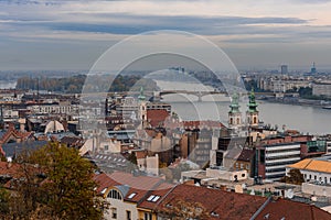 A view of the rooftops of Budapest, and the river Danube, on an autumn day